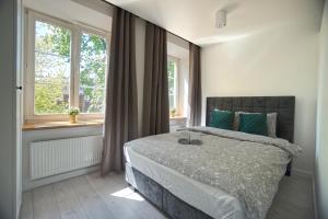Posteľ alebo postele v izbe v ubytovaní Warsaw Premium Apartments Old Town