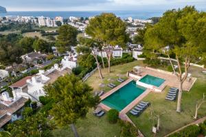an aerial view of a house with a swimming pool at Hotel Ritual de Terra & SPA in Jávea