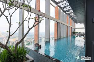 a swimming pool on the floor of a building at 2Br Family Suite MILLERZ SQUARE // KL & Free Parking in Kuala Lumpur