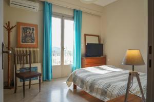 Postel nebo postele na pokoji v ubytování MARIALINA NAFPLIO
