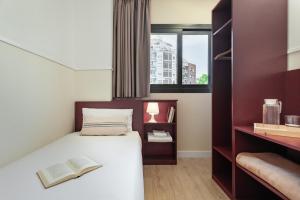 Posteľ alebo postele v izbe v ubytovaní Apartments Sata Olimpic Village Area