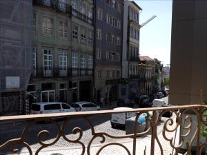 a view of a city street from a balcony at Framer's House - Authentic Downtown in Porto