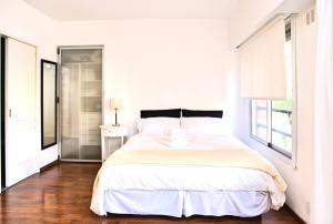 A bed or beds in a room at Moderno y Selecto! Buenos Aires - Villa Urquiza