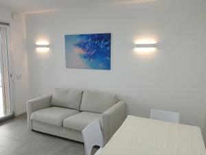 Ruang duduk di Opalia Residence - Wonderful Garda Lake view Apartment