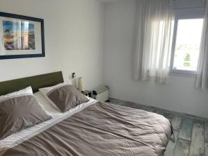 Posteľ alebo postele v izbe v ubytovaní Superbe appartement avec roof top et piscine + 7 fotografií