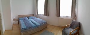 Postel nebo postele na pokoji v ubytování Ferienwohnung Schuhhaus Ganster