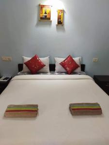 Postelja oz. postelje v sobi nastanitve Spectrum Hub beach side Studio Apartment - Candolim - Goa