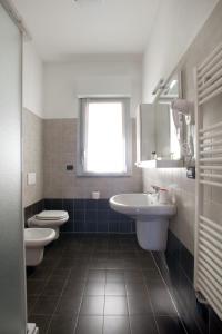 Koupelna v ubytování Residence Le Querce