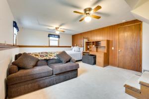 a living room with a couch and a bed at Clear Lake Vacation Home Rental - Pet Friendly! in Clear Lake +20 photos