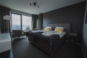 Postel nebo postele na pokoji v ubytování Skepparholmen Nacka + 22 fotografií