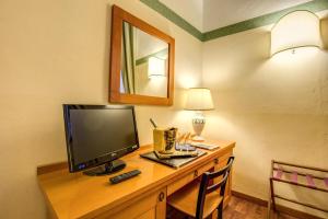 TV a/nebo společenská místnost v ubytování Hotel Botticelli