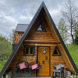 a tiny house with a pointed roof at Eco kutak 2 in Mojkovac