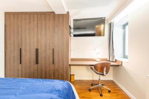 Łóżko lub łóżka w pokoju w obiekcie Cocoon du vieux Lyon - Luxury apartment - Balneo