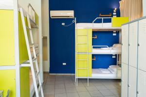 Postel nebo postele na pokoji v ubytování Abraham Tel Aviv