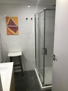 a bathroom with a shower and a sink at CASA DA ALAMEDA in Nisa +13 photos
