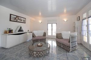 Posezení v ubytování Vaste appartement vue Rocher du Diamant