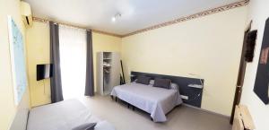 Postel nebo postele na pokoji v ubytování Tarchon Luxury B&B