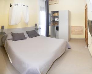 Postel nebo postele na pokoji v ubytování Tarchon Luxury B&B