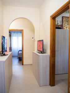 TV a/nebo společenská místnost v ubytování Tarchon Luxury B&B