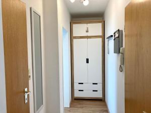 a hallway with a door leading to a room at Anton-Gunther-Str 16 in Wangerooge