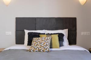 Postel nebo postele na pokoji v ubytování PHOENIX maison d'hôtes & SPA