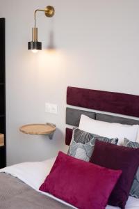 Postel nebo postele na pokoji v ubytování PHOENIX maison d'hôtes & SPA