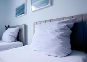 Postel nebo postele na pokoji v ubytování Das Schreder Hotel