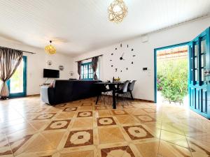 TV a/nebo společenská místnost v ubytování Cactus Living