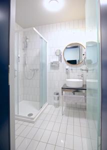 Koupelna v ubytování Das Schreder Hotel
