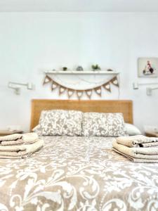 Posteľ alebo postele v izbe v ubytovaní Apartamento Empedrada