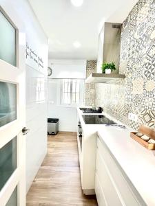 Kuchyňa alebo kuchynka v ubytovaní Apartamento Empedrada