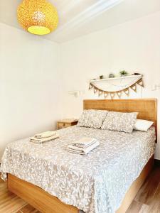 Posteľ alebo postele v izbe v ubytovaní Apartamento Empedrada