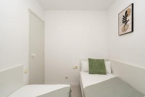 Ein Bett oder Betten in einem Zimmer der Unterkunft Apartment Bitacora FULLY RENOVATED 2023