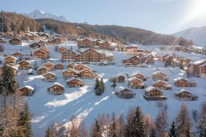 an aerial view of a village covered in snow at Ekseption - 7-room chalet + sauna 12/14 persons in Peisey-Nancroix
