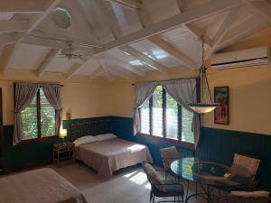 Postel nebo postele na pokoji v ubytování Playa Negra Guesthouse + 37 fotografií