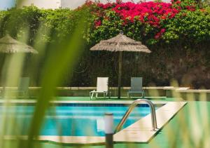 A piscina localizada em Hotel Baluma Porto Petro ou nos arredores