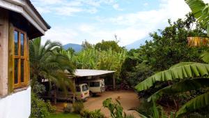 a van parked in front of a house at Zion Care Homestay in Arusha