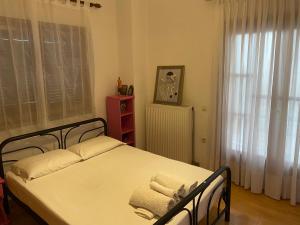 Postel nebo postele na pokoji v ubytování Upper Neighbourhood
