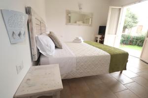 Postel nebo postele na pokoji v ubytování B&B Limone