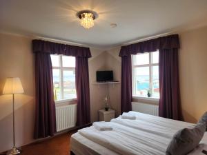 Postel nebo postele na pokoji v ubytování Kiljan Apartments & Rooms