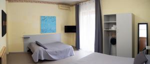 Postel nebo postele na pokoji v ubytování Tarchon Luxury B&B
