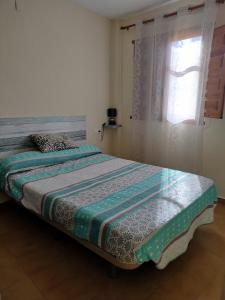 Posteľ alebo postele v izbe v ubytovaní Casa Abuelo Lorenzo