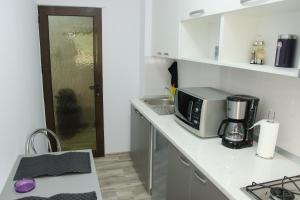 Kuchyň nebo kuchyňský kout v ubytování studio casa 2 + 2 fotografie