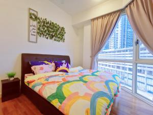 Katil atau katil-katil dalam bilik di Legoland and Gleneagle- 3min Walk with Bathub-Cityview at Afiniti Residency -8pax-Cozy