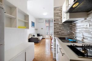 a kitchen with a sink and a counter top at Monolocale 9 in Borgio Verezzi