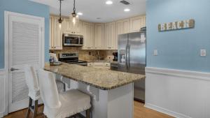 Η κουζίνα ή μικρή κουζίνα στο Blue Tide 3B