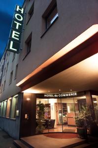 a hotel entrance with a hotel sign in front of it at Residence Apartments by Hotel du Commerce in Basel