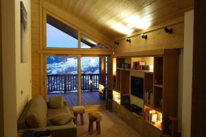 Posezení v ubytování Epinette 31 Luxury appartment Duplex (9p) 4 bedrooms and 2 bathrooms.