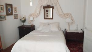 Кровать или кровати в номере La maison de Léa