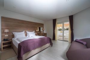 Postel nebo postele na pokoji v ubytování Hotel Biokovo